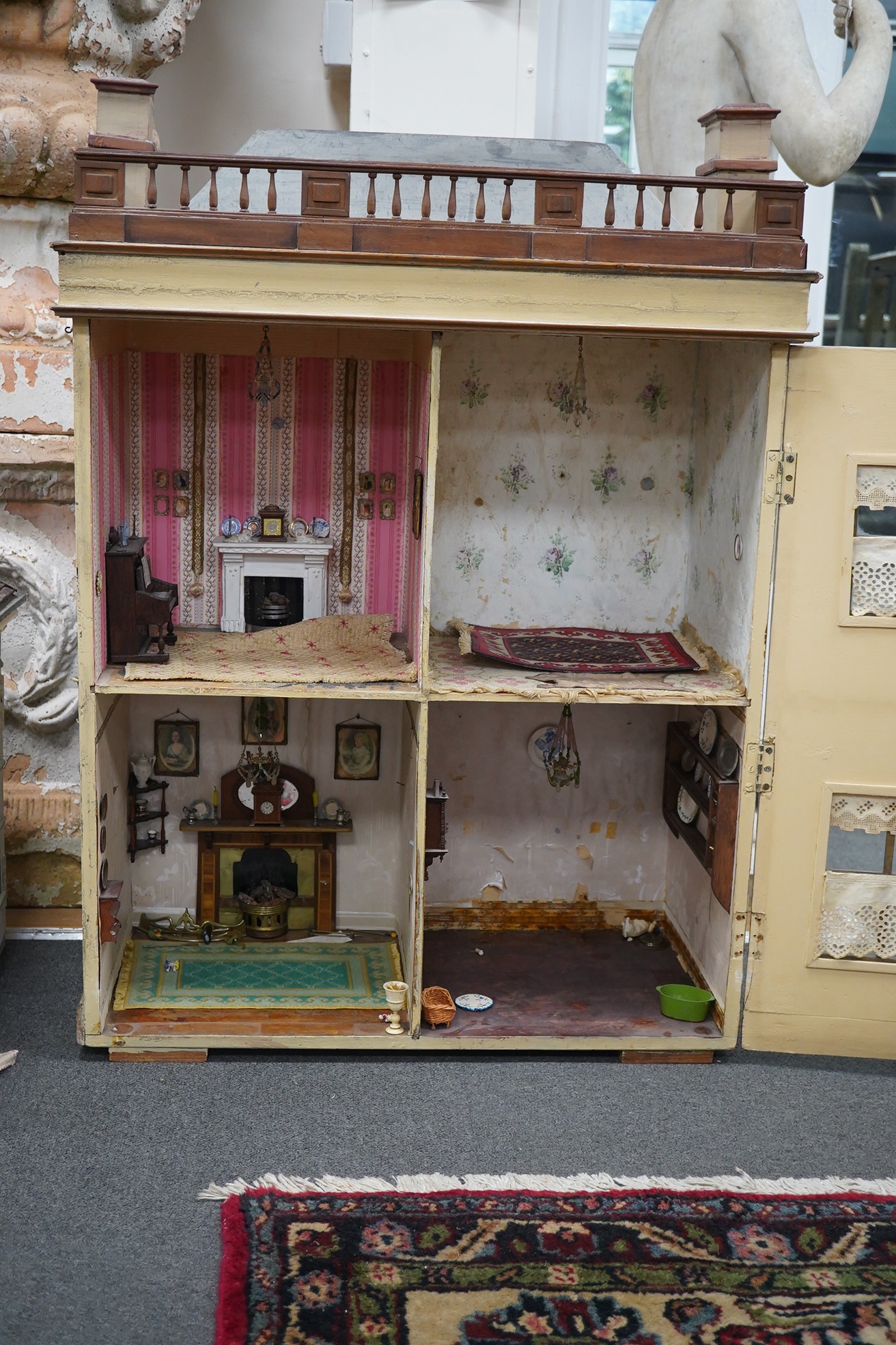 A early 20th century George III style doll’s house ‘Hinxworth Place’, together with extensive furnishings, height 97cm, width 72cm, depth 35cm. Condition - fair.